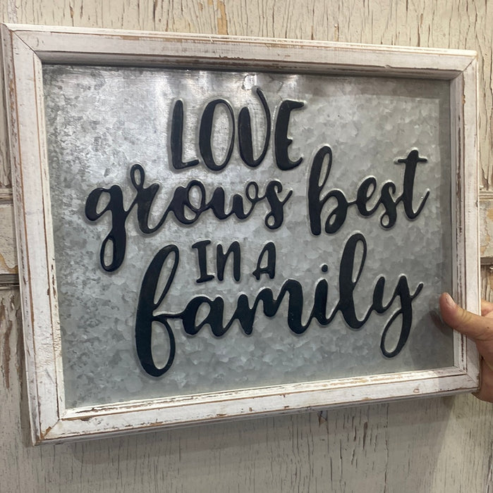 LOVE GROWS BEST IN A FAMILY METAL SIGN