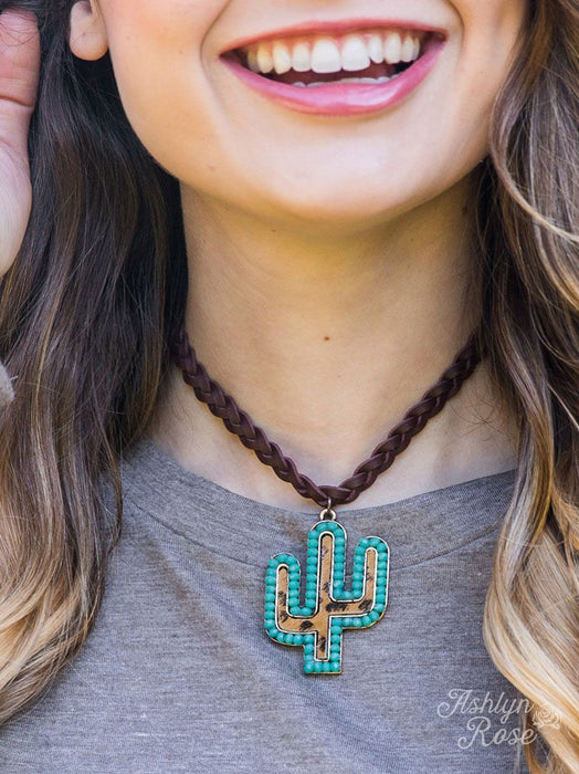 LEOPARD TURQUOISE CACTUS PENDANT ON BROWN LEATHER BRAIDED NECKLACE